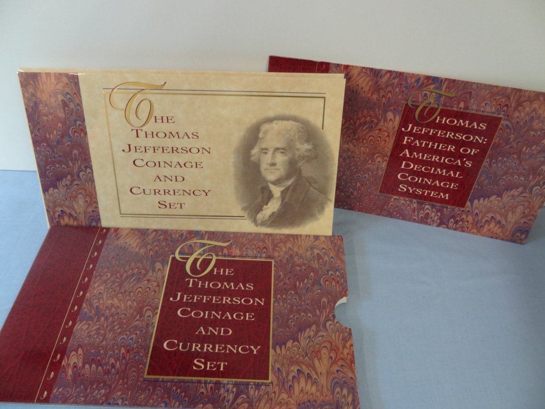 THE THOMAS JEFFERSON COINAGE AND CURRENCY SET AN UNCIRC: THE THOMAS JEFFERSON COINAGE AND CURRENCY SET AN UNCIRCULATED THOMAS JEFFERSON 250TH ANNIVERSARY SILVER DOLLAR AND 1994 THOMAS JEFFERSON NICKEL AND 1976 JEFFERSON TWO DOLLAR NOTE. INCLUDES PRESENTATIO