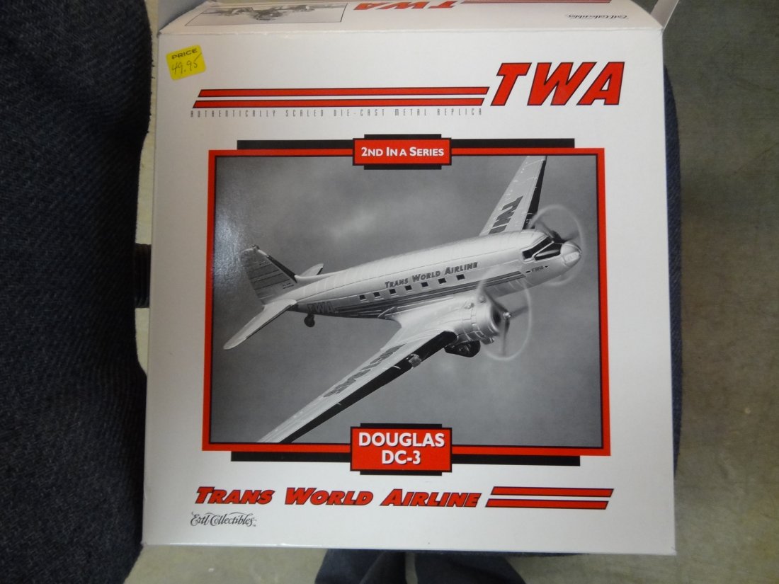 TWO DIE CAST METAL REPLICA AIR PLANES; ERTL COLLECTIBLE: TWO DIE CAST METAL REPLICA AIR PLANES; ERTL COLLECTIBLES TWA DOUGLAS DC-3 AIRPLANE AND A MODEL POWER FOKKER DR-1 TRIPLANE. NEW IN BOX.