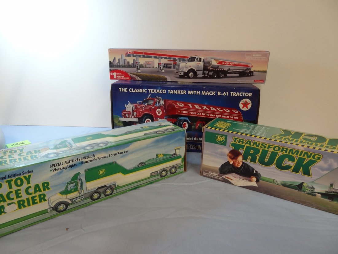 FOUR DIE CAST MODEL TRUCKS; FRANKLIN MINT PRECISION MOD: FOUR DIE CAST MODEL TRUCKS; FRANKLIN MINT PRECISION MODELS THE CLASSIC TEXACO TANKER WITH MACK B-61 TRACTOR; BP 1997 COLLECTOR'S LIMITED EDITION TRANSFORMING TRUCK; 1993 LIMITED EDITION SERIES BP TOY 