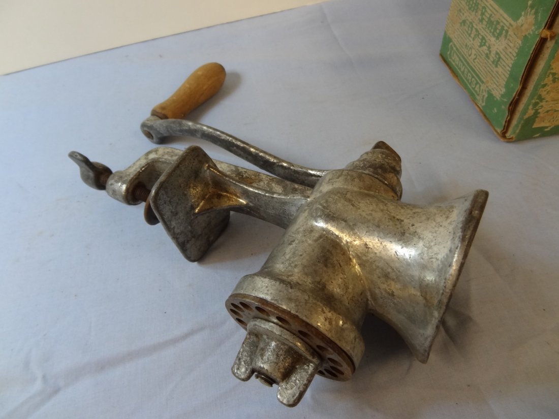 FOOD & MEAT GRINDER. ONE IN ORIGINAL BOX WITH EXTRA PAR: FOOD & MEAT GRINDER. ONE IN ORIGINAL BOX WITH EXTRA PARTS; OTHER NO BOX OR EXTRA PARTS. BOX READS ''UNIVERSAL CHOPPER DIV. UNION MFG. CO. MERIDEN, CONN.''