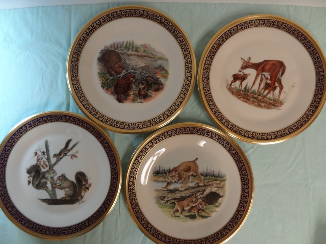 LENOX/BOEHM LTD EDITION WOODLAND WILDLIFE 10.5'' WIDE P: LENOX/BOEHM LTD EDITION WOODLAND WILDLIFE 10.5'' WIDE PLATES. GROUP OF FOUR PLATES - 1977,1978,1979 AND 1980 WILDLIFE THEME BEAVERS, WHITETAIL DEER, SQUIRREL, AND BOBCAT. PRESENTED BY LENOX, DESIGNED 