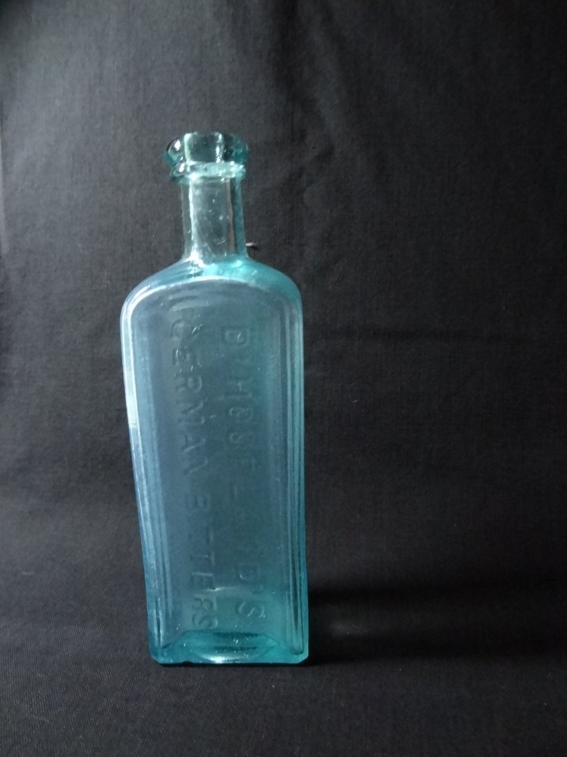 VINTAGE BOTTLES, DR. HOOFLAND'S GERMAN BITTERS / DYSPEP: VINTAGE BOTTLES, DR. HOOFLAND'S GERMAN BITTERS / DYSPEPSIA & LIVER COMPLAINT / PHILADELPHIA . AQUA BLUE BOTTLE, 8''T X 2''W X 1 1/2'' DEEP. CIRCA 1850.