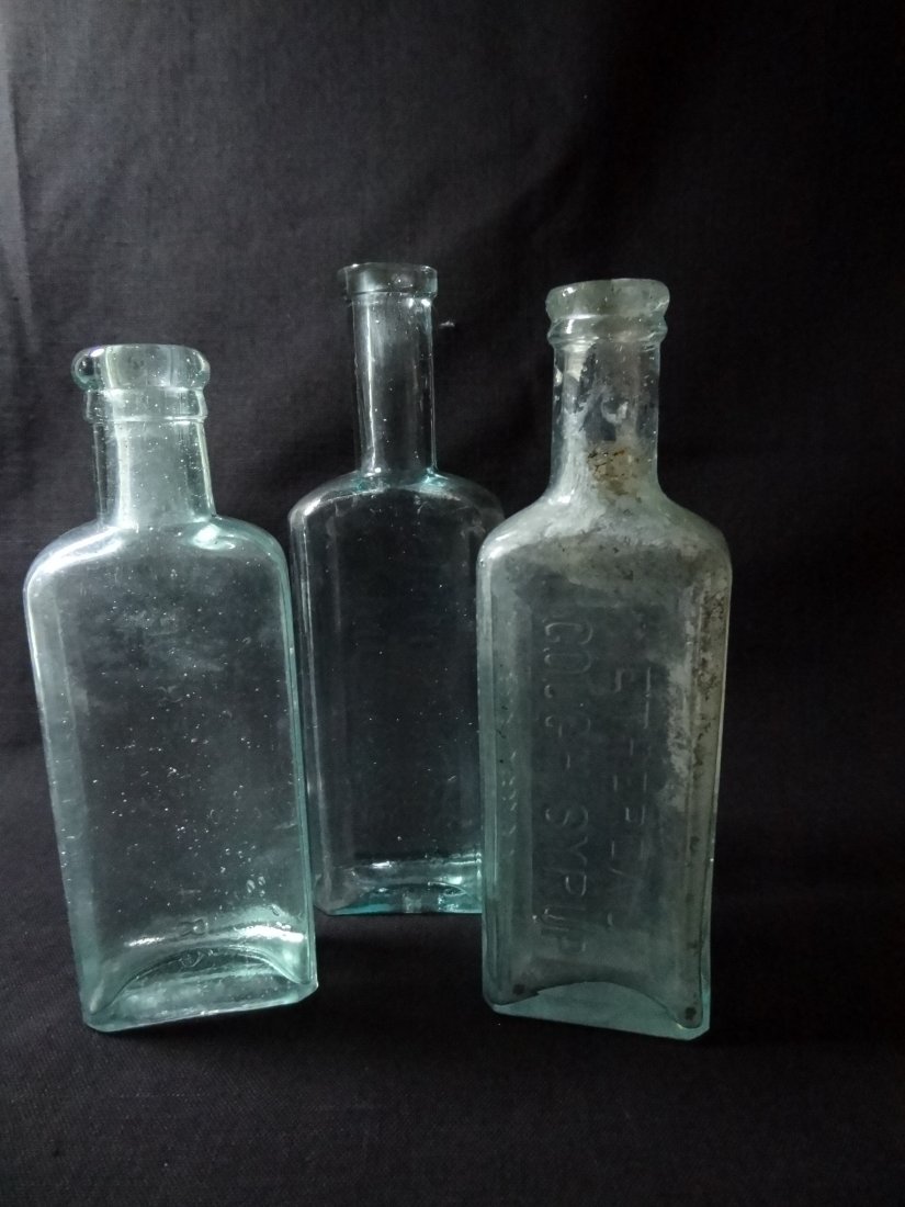 VINTAGE AQUA BOTTLES - 3 BOTTLES - 1) ''HERB BITTERS / : VINTAGE AQUA BOTTLES - 3 BOTTLES - 1) ''HERB BITTERS / S.B. GOFF'S / CAMDEN N.J.'' - 5 7/8''T X 2''W X 1'' DEEP; 2) ''ETHEREAL COUGH SYRUP / STOCKTON, CAL / I.D. HOLDEN'' 6''T X 2'' W X 1 1/4'' DEEP; 