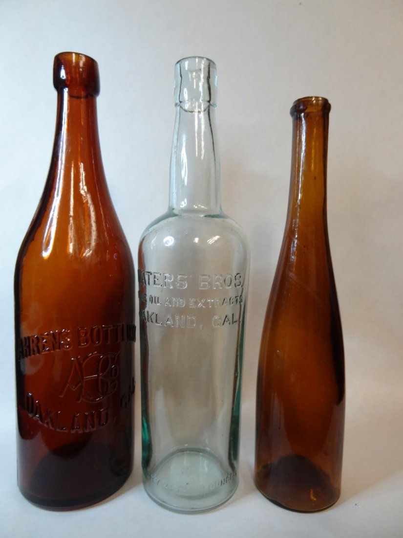 VINTAGE BRECKENFELDER & YOCHEM AMBER BOTTLES. 1) BRECKE: VINTAGE BRECKENFELDER & YOCHEM AMBER BOTTLES. 1) BRECKENFELDER & YOCHEM OAKLAND, CAL 12'' BY 3 1/8 BOTTOM EMBOSSED '201' IN 2)BRECKENFELDER & YOCHEM OAKLAND, CAL 9'' BY 2 5/8''. BOTTOM EMBOSSED 'PCCW'