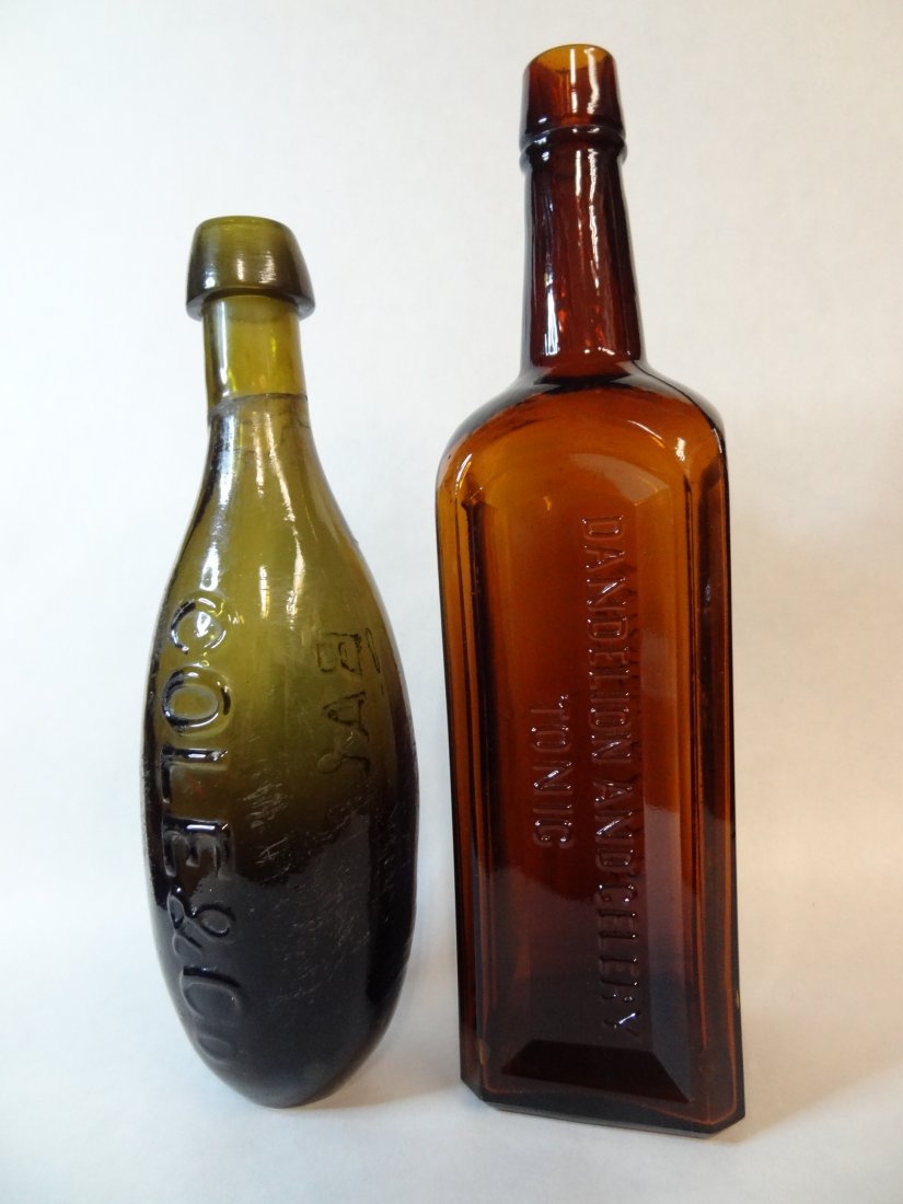 VINTAGE BOTTLES. 1)AMBER THOMPSON'S DANDELION AND CELER: VINTAGE BOTTLES. 1)AMBER THOMPSON'S DANDELION AND CELERY TONIC, 10.5'' BY 2.5'' SQUARED. IN GOOD CONDITION. 2)GREEN COLE & CO BALT. SHAPED LIKE A BOWLING PIN, NICE REPAIR JOB AT NECK OF BOTTLE, SURFAC