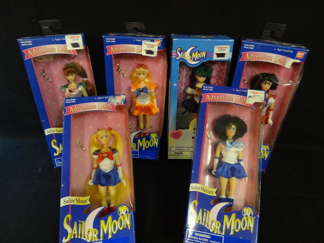 SIX SAILOR MOON ADVENTURE DOLLS; SAILOR MOON, SAILOR PL: SIX SAILOR MOON ADVENTURE DOLLS; SAILOR MOON, SAILOR PLUTO, SAILOR VENUS, SAILOR JUPITER, SAILOR MERCURY, SAILOR MARS, AGES 4+, 1995 NAOKA TAKEUCHI/KODANSHA, TOEI ANIMATION, 6'' DOLL, MINT IN BOX. SOM