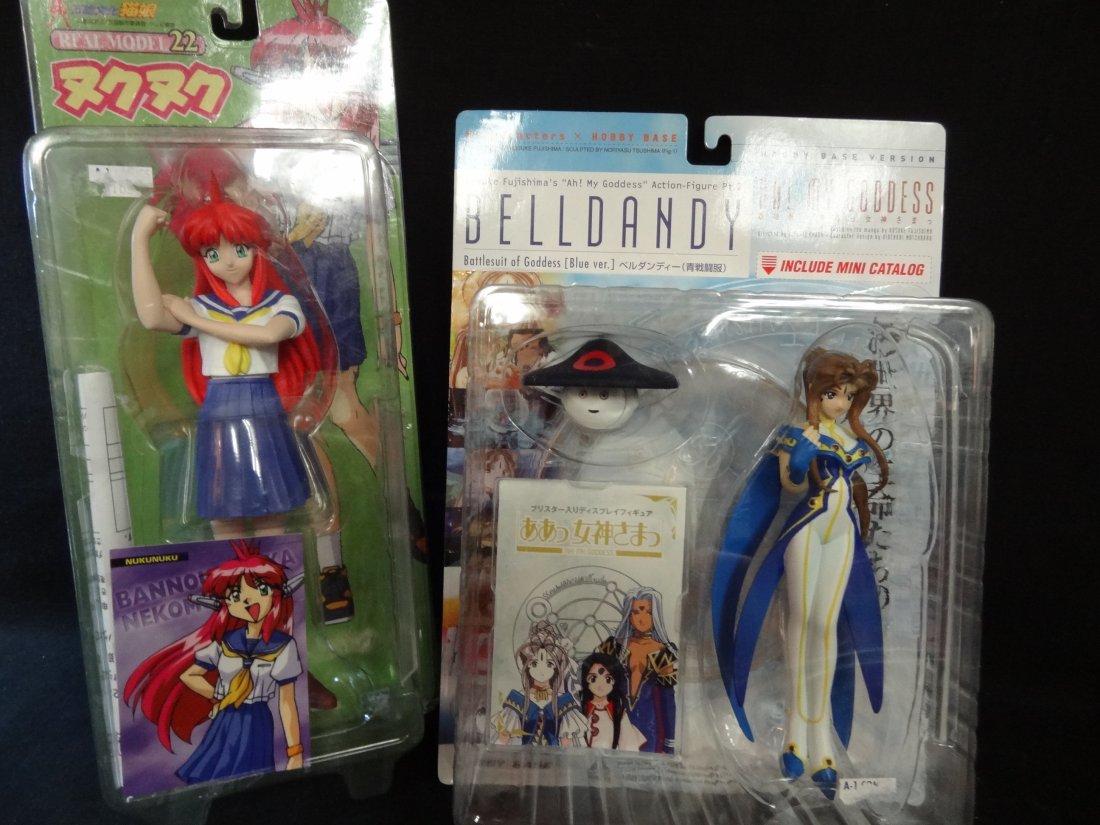 1) KOSUKE FUJISHIMA'S ''AH! MY GODDESS'' BELLDANDY ACT: 1) KOSUKE FUJISHIMA'S ''AH! MY GODDESS'' BELLDANDY ACTION FIGURE DOLL, 2000 HOBBY BASE, AGES 15+ 6'' DOLL, MINT IN BOX. 2)NUKU NUKU REAL MODEL 22, SEGA, 8'' DOLL, MINT IN BOX, BOX SHOWS SOME WEAR.