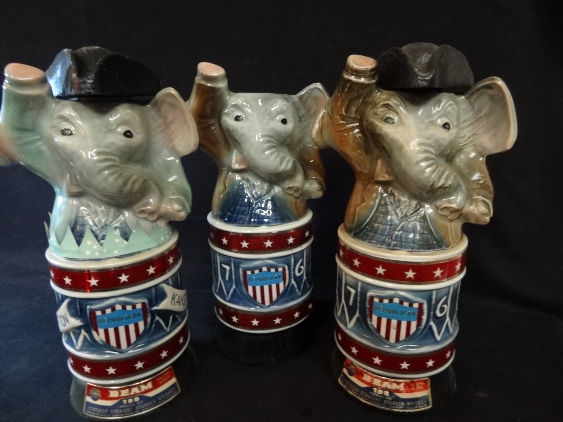 VINTAGE JIM BEAM 1976 REPUBLICAN NATIONAL CONVENTION DE: VINTAGE JIM BEAM 1976 REPUBLICAN NATIONAL CONVENTION DECANTERS KC EMPTY. ONE DECANTER IS MISSING A HAT AND CORK, 11.5'' TALL.