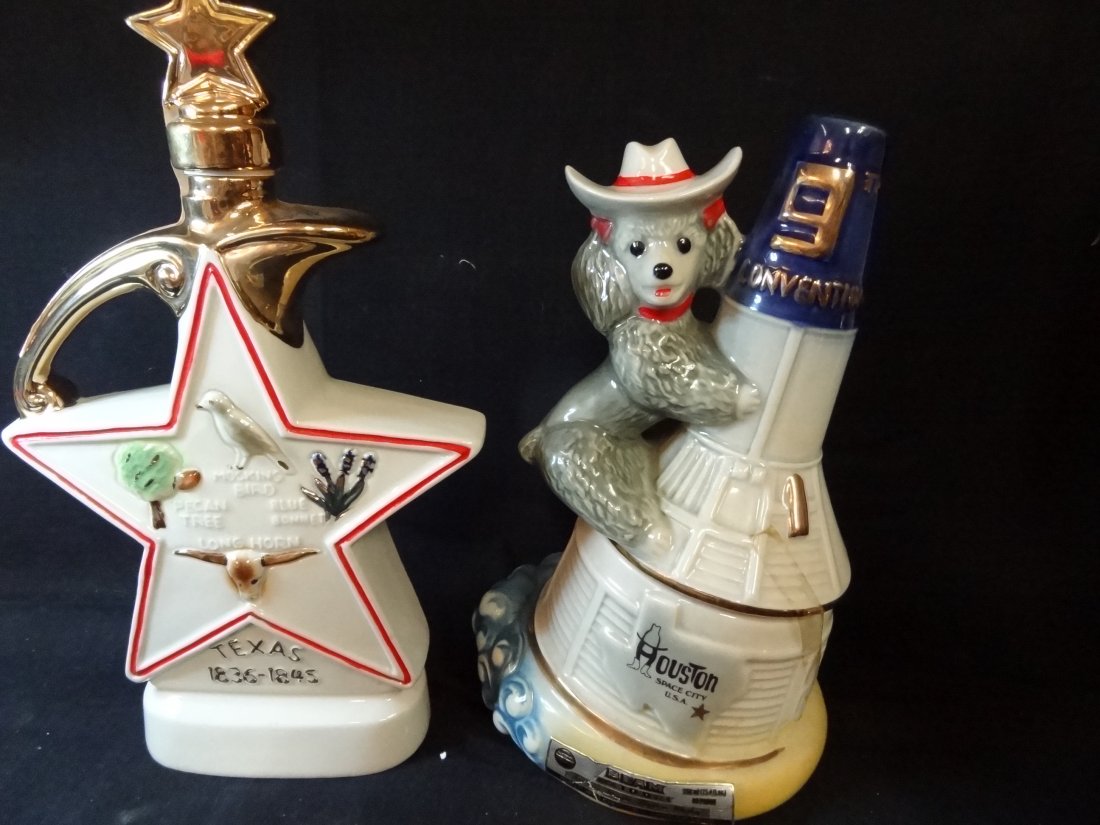 TWO JIM BEAM DECANTERS: 1979 HOUSTON TEXAS 9TH CONVENTI: TWO JIM BEAM DECANTERS: 1979 HOUSTON TEXAS 9TH CONVENTION DECANTER, 11'' TALL. 1980 JIM BEAM REPUBLIC OF TEXAS LONE STAR DECANTER, 13'' TALL.
