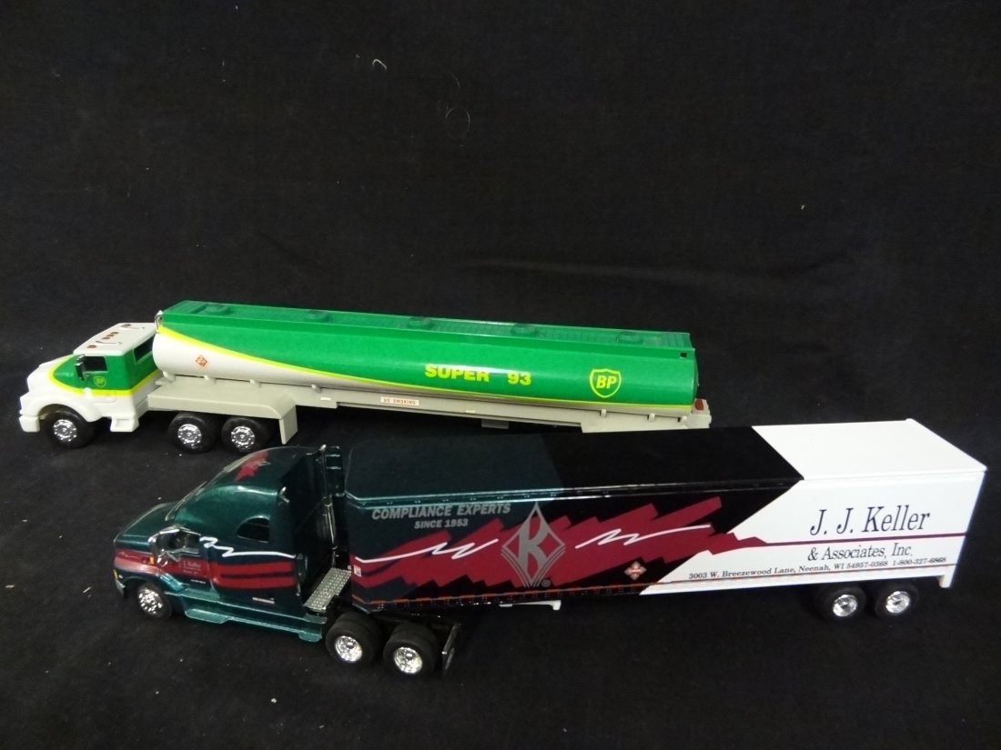 TWO METAL AND PLASTIC MODEL TRUCKS: 1) J.J. KELLER & AS: TWO METAL AND PLASTIC MODEL TRUCKS: 1) J.J. KELLER & ASSOCIATES TRACTOR TRAILER, 14'' LONG, NEW IN BOX. 2) BP SUPER 93 TRACTOR TRAILER, 14.5'' LONG.