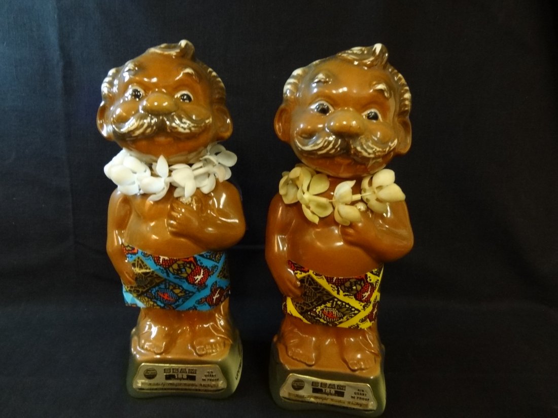 TWO JIM BEAM HAWAIIAN DECANTERS, 4/5 QUART, 13'' TALL, : TWO JIM BEAM HAWAIIAN DECANTERS, 4/5 QUART, 13'' TALL, GOOD CONDITION EXCEPT ONE CORK IS BROKEN.