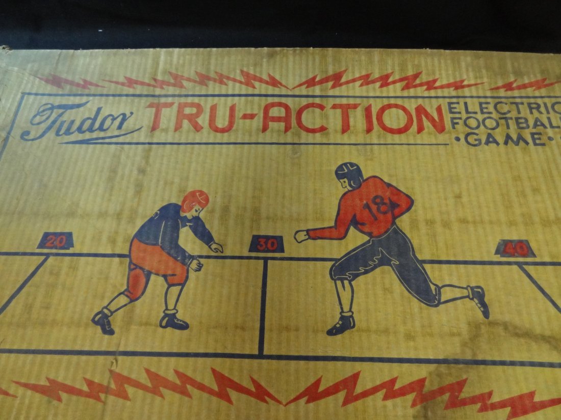 TUDOR TRU-ACTION ELECTRIC FOOTBALL GAME TABLE TOP STYLE: TUDOR TRU-ACTION ELECTRIC FOOTBALL GAME TABLE TOP STYLE SOME USE TO GAME TOP AND BOX SHOWS WARE