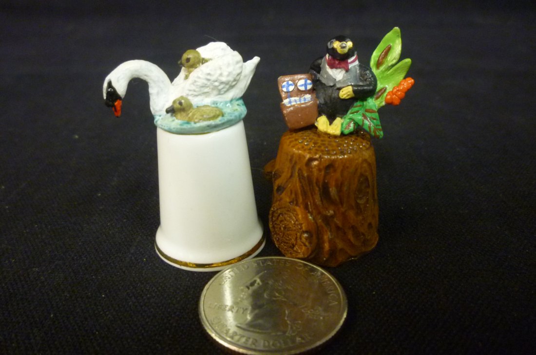 TWO THIMBLES WITH SWAN AND PENGUIN.: TWO THIMBLES WITH SWAN AND PENGUIN.