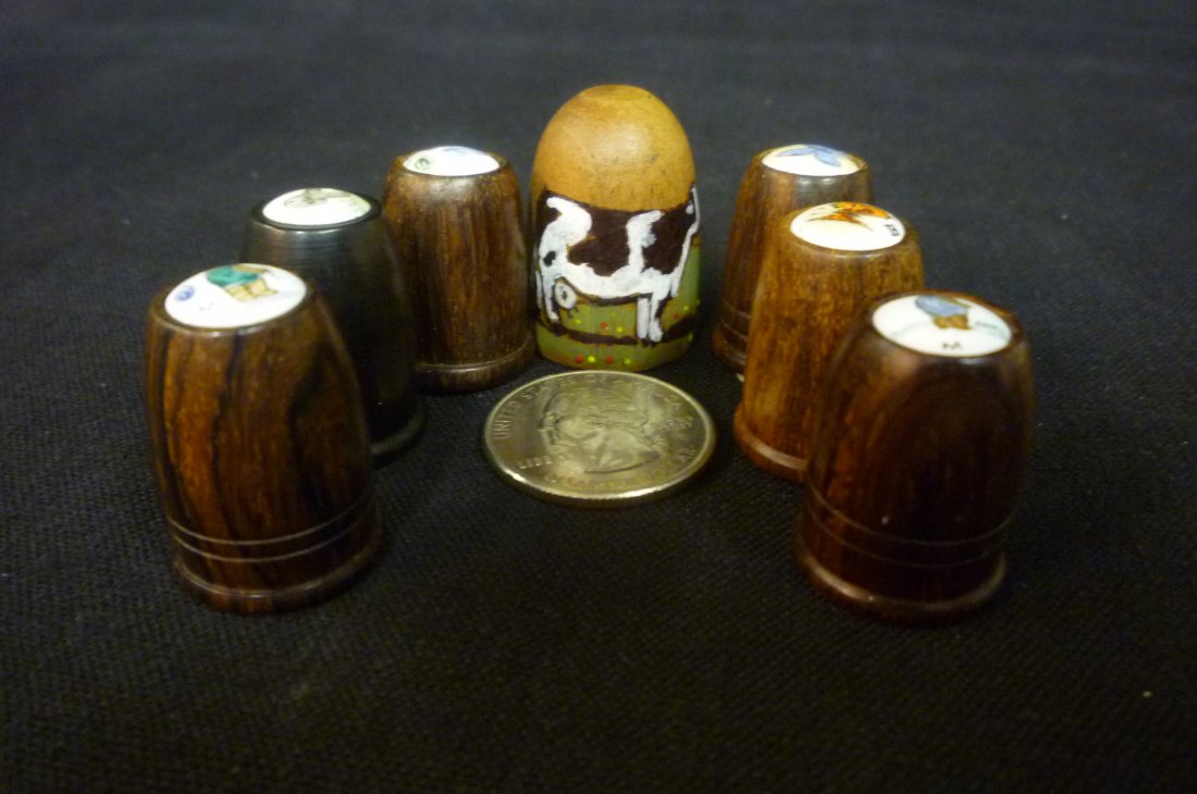 SEVEN COLLECTIBLE WOODEN THIMBLES.: SEVEN COLLECTIBLE WOODEN THIMBLES.