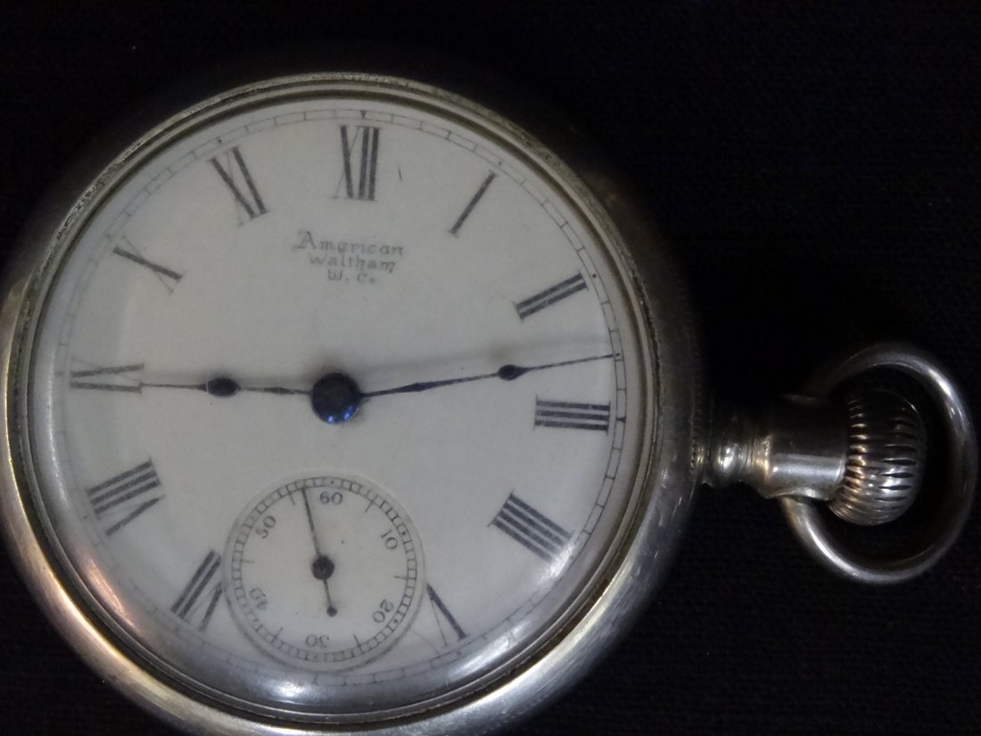 AMERICAN WALTHAM POCKET WATCH WITH SILVER CASEM: AMERICAN WALTHAM POCKET WATCH WITH SILVER CASEMENT. 2'' X 3'', GOOD CONDITION