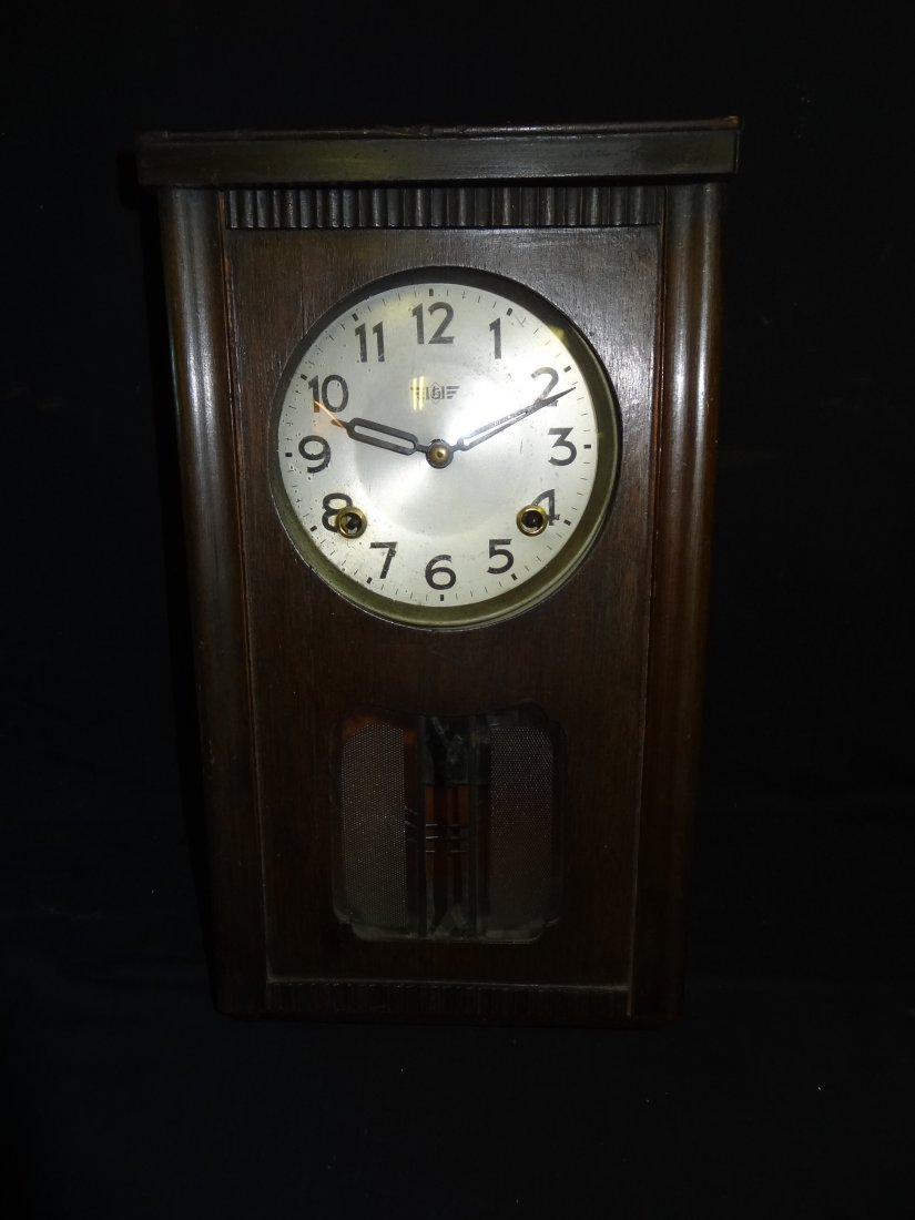 ART DECO WALL CLOCK WITH ETCHED AND BEVELED GLA: ART DECO WALL CLOCK WITH ETCHED AND BEVELED GLASS ON FRONT. 9'' X 16'', WEIGHS 6 LBS. TAHSAC IS NOT EQUIPPED TO SHIP THIS ITEM. PLEASE CALL FOR LOCAL SHIPPING COMPANY'S CONTACT INFORMATION.