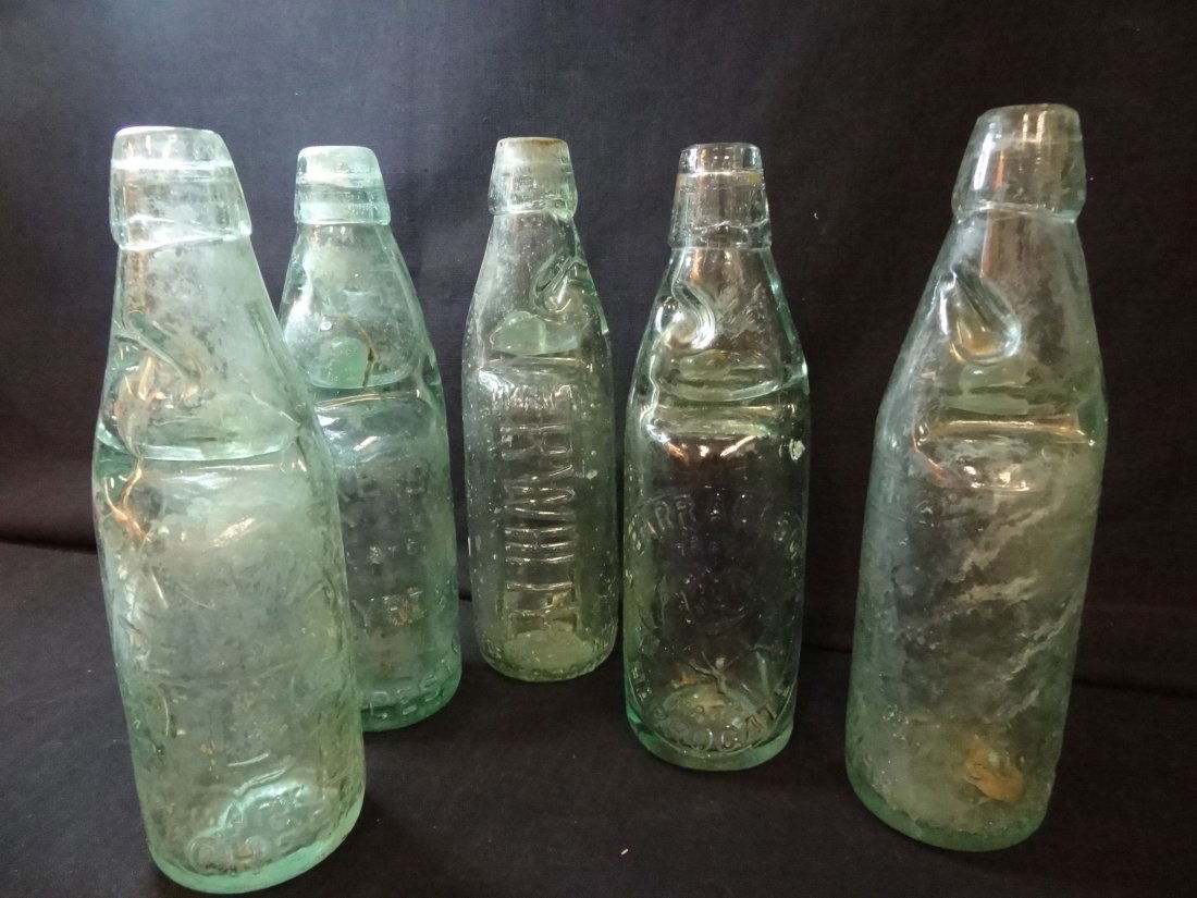 FIVE AQUA MARBLE NECKED BOTTLES: GEAKE BROS., R. WHITE,: FIVE AQUA MARBLE NECKED BOTTLES: GEAKE BROS., R. WHITE, C. BARRACLOUGH, JAMES DYSON, AND J. LANG.