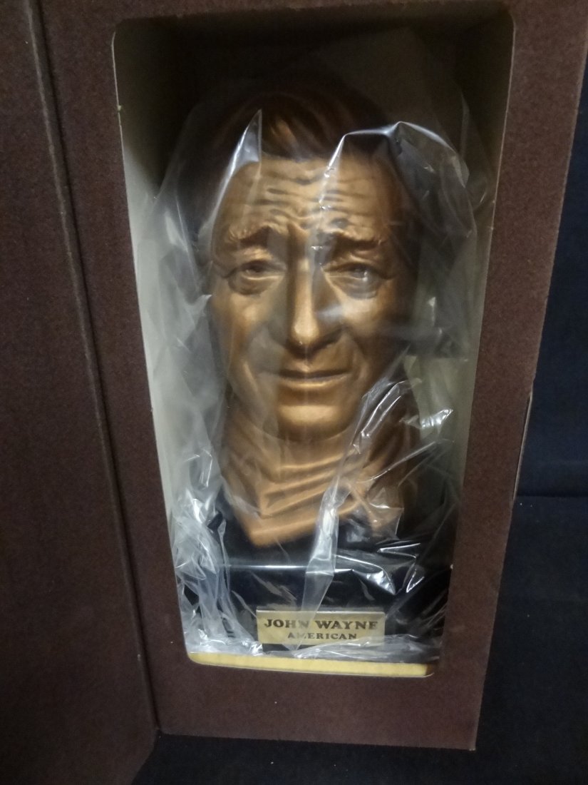 JOHN WAYNE AMERICAN LIQUOR DECANTER, MIKE WAYNE DISTILL: JOHN WAYNE AMERICAN LIQUOR DECANTER, MIKE WAYNE DISTILLING CO. BARDSTOWN, KENTUCKY, 11'' TALL, IN BOX, EMPTY.
