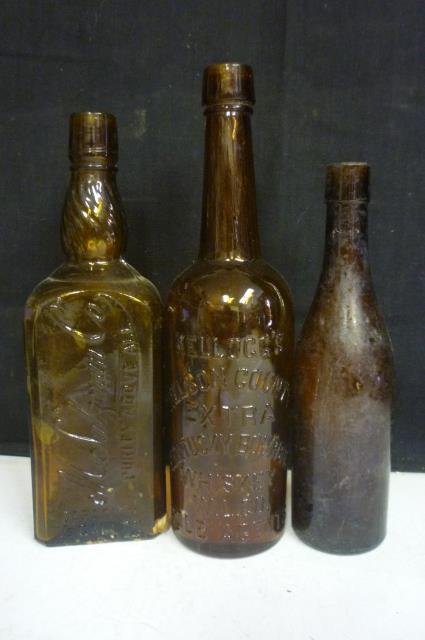 ANTIQUE BOTTLES: M SALZMAN CO "PURITY ABOVE ALL"; KELLO: PURITY ABOVE ALL; KELLOG'S NELSON COUNTY EXTRA KENTUCKY BOURBON WHISKEY; AND ONE UNMARKED