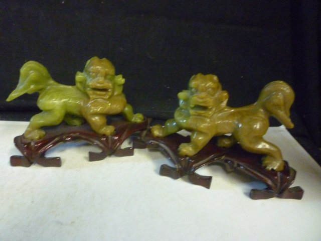 SOAPSTONE LION CARVINGS WITH WOODEN BASES, ASIAN STYLE,: BASES, ASIAN STYLE, APPROX. 4" WHILE STANDING ON BASES.