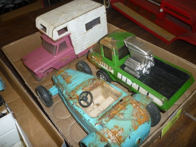 VINTAGE TOY TRUCKS: NYLINT CAR, TONKA TRUCK, AND TONKA: AND TONKA CAMPER, ALL METAL. SOME RUST AND WHEELS MISSING.