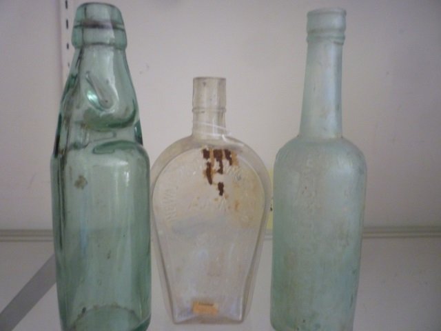 ANTIQUE BOTTLES: NEWMARK CRUENBERG & CO AAA S.F.: S.F. (OPALESCENT), MARBLE NECKED SODA BOTTLE, AND PETTYWOOD & CO WORCESTERSHIRE SAUCE (OPALESCENT)