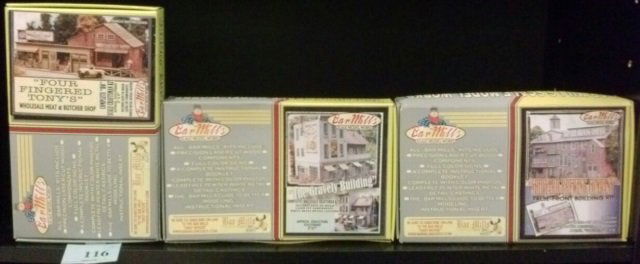BAR MILLS HO SCALE BUILDING KITS(3) BAR MILLS SCALE MOD: BAR MILLS SCALE MODEL WORKS KITS: "FOUR FINGERED TONY'S" WHOLESALE MEAT & BUTCHER SHOP, "THE GRAVELY BUILDING", & "SHIPYARD BREWING COMPANY" FALSE-FRONT BUILDING KIT.