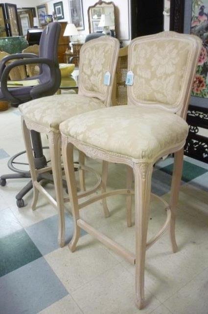 PAIR TALL BAR STOOLS TAN UPHOLSTERY WHITE WASH FINISH W: WHITE WASH FINISH WOOD CHAIRS WITH TAN FLOWER PRINT UPHOLSTRY, PADDED , BOTH CHAIRS 3' 7" TALL