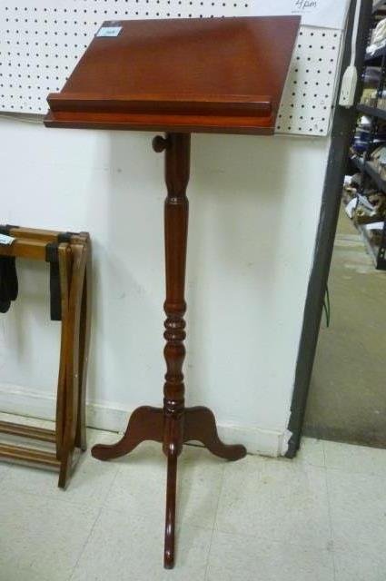 WOOD PODIUM WOOD SPEAKERS PODIUM APPROX 4' TALL STAINED: WOOD SPEAKERS PODIUM APPROX 4' TALL STAINED DARK MAHAGONY-CHERRY COLOR, TOP PIECE LOOSENS WITH KNOB AND FLIPS FROM FRONT TO BACK.