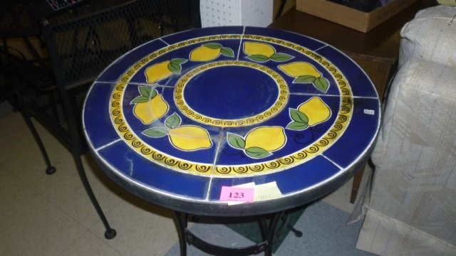 SMALL ROUND TILE TOP TABLE 24" ACROSS, METAL BASE WITH: 24" ACROSS, METAL BASE WITH TILE TOP LEMON PATTERN ON TOP