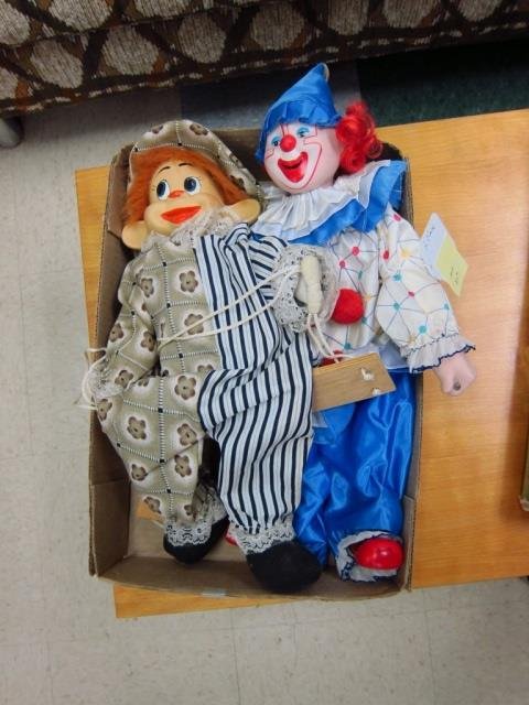 2 CLOWN DOLLS CERAMIC HEADS AND CLOTH BODIES, BOTH ON: CERAMIC HEADS AND CLOTH BODIES, BOTH ON SWINGS