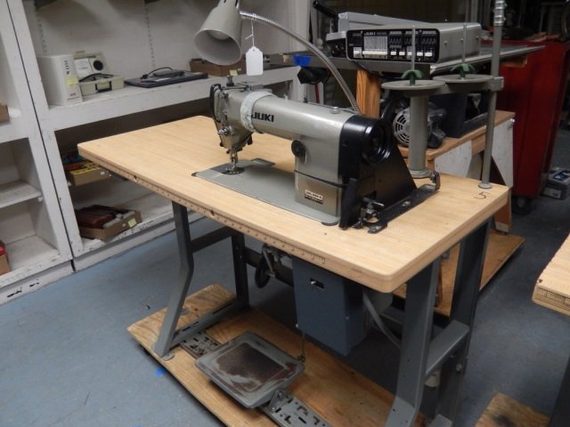 INDUSTRIAL FABRIC SEWING MACHINE INDUSTRIAL GRADE: INDUSTRIAL GRADE FABRIC SEWING MACHINE BY JUKI. MODEL NO: DDL 555-5 WITH MC-300 ATTACHMENT