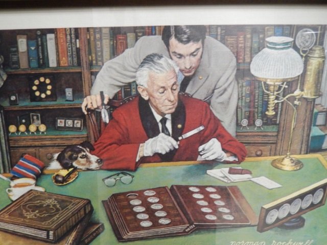 NORMAN ROCKWELL NORMAN ROCKWELL ON FABRIC. SIGNED IMAGE: NORMAN ROCKWELL ON FABRIC. SIGNED IMAGE OF TWO MEN AND THEIR COIN COLLECTION WITH DOG. IMAGE APPROX 17.5' X 11'. APPROX 21' X 15' IN FRAME.