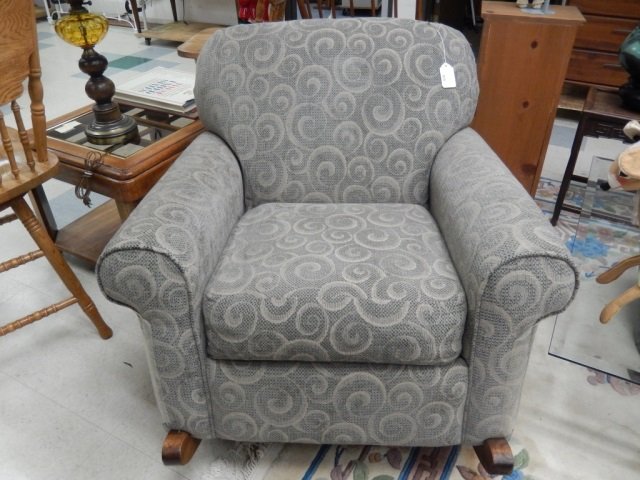 ROCKING CHAIR CLOTH ROCKING CHAIR. NEUTRAL COLORS. IN: CLOTH ROCKING CHAIR. NEUTRAL COLORS. IN GOOD CONDITION. APPROX 33' WIDE X 44' DEEP X 36' TALL