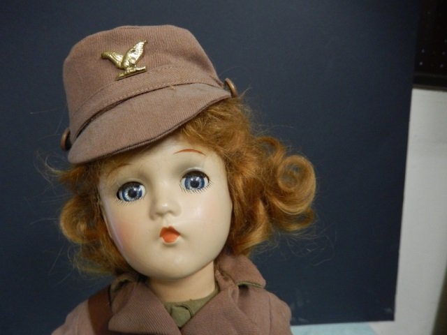 EFFANBEE SHIRLEY TEMPLE ARMY DOLL EFFANBEE SHIRLEY: EFFANBEE SHIRLEY TEMPLE ARMY MESSANGER DOLL. APPROX 15' TALL. EXCELLENT CONDITION. HAS ORIGINAL OUTFIT, MESSANGER BAG AND HAIR CLIP. DOLL HAS BLINKING BLUE EYES AND MOVING JOINTS.