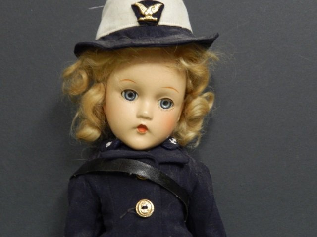 EFFANBEE SHIRLEY TEMPLE NAVY DOLL EFFANBEE SHIRLEY: EFFANBEE SHIRLEY TEMPLE NAVY MESSANGER DOLL. APPROX 15' TALL. EXCELLENT CONDITON. COMES WITH ORIGINAL OUTFIT, MESSANGER BAG AN HAIR CLIP. BLOND HAIR WITH BLINKING BLUE EYES AND MOVING JOINTS.