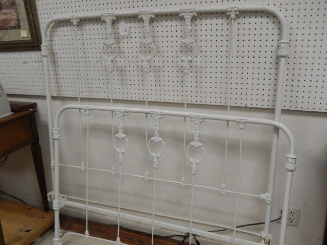 WROUGHT IRON BED VINTAGE VINTAGE WROUGHT IRON BED. FULL: VINTAGE WROUGHT IRON BED. FULL SIZE. PAINTED WHITE. IN GOOD CONDITION. HEADBOARD APPROX 52' X 55' TALL. FOOTBORD IS APPROX 52' X 38' TALL