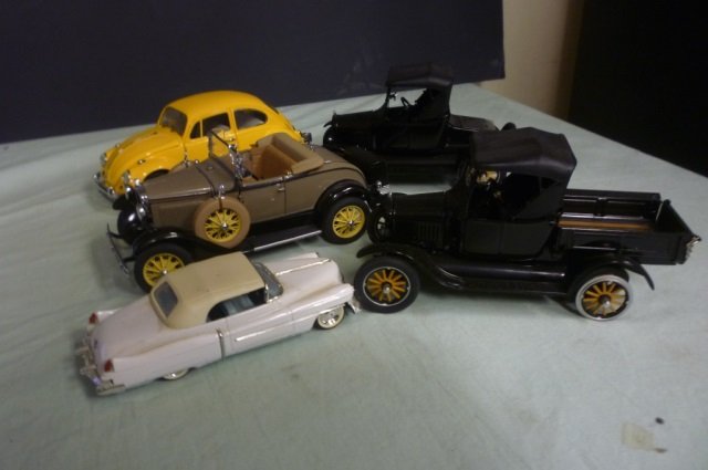 5 SMALL MODEL CARS LOT OF 5 SMALL MODEL CARS INCLUDES: LOT OF 5 SMALL MODEL CARS INCLUDES 67' VW BEETLE, 60'S CADILLAC, 25' FORD T RUNABOUT, 25' FORD MODEL T, 31' FORD MODEL A