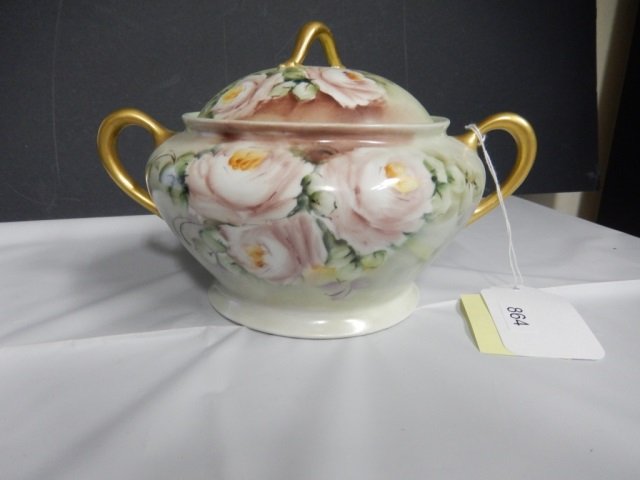 KPM, GERMANY COVERED BOWL GREEN COVERED PORCELAIN BOWL: GREEN COVERED PORCELAIN BOWL WITH FLORAL DESIGN AND GOLD TRIM. APPROX 9' WIDE MARKED "KPM, 850" ON BOTTOM. IN EXCELLENT CONDITION. DESIGN IS ON BOTH SIDES OF BOWL