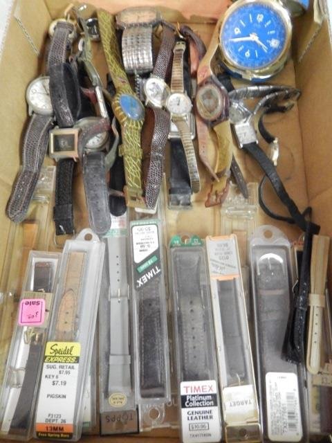 WATCHES AND EXTRA BANDS LOT OF WATCHES INCLUDES 19: LOT OF WATCHES INCLUDES 19 LADIES WATCHES, 2 EXTRA FACES, 1 ALARM CLOCK, 2 BANDS AND 15 BANDS NEW IN BOX. BRANDS INCLUDE TIMEX AND FOSSIL.