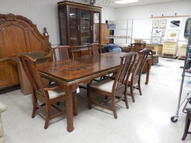 DINING TABLE WITH 6 CHAIRS NICE DINING TABLE WITH 2: NICE DINING TABLE WITH 2 LEAVES AND 6 CHAIRS. TABLE IS ENGRAVED WITH FLOWERS AND IS APPROX 66" LONG X 30" TALL X 44" WIDE. PICTURED WITH BOTH LEAVES