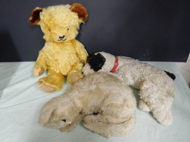 3 VINTAGE STUFFED ANIMALS LOT INCLUDES 3 VINTAGE: LOT INCLUDES 3 VINTAGE STUFFED ANIMALS. 1 BEAR WITH ROTATING LIMBS, APPROX 14' TALL. 1 DOG, APPROX 15' LONG AND 1 CAT, APPROX 12' LONG