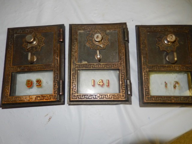 3 ANTIQUE POST OFFICE BOX DOORS LOT INCLUDES 3 ANTIQUE: LOT INCLUDES 3 ANTIQUE COPPER / BRONZE ANTIQUE POST OFFICE BOX DOORS. EACH IS APPROX 3.5" X 5"
