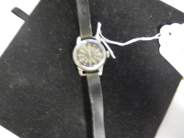 MILITARY WATCH FROM THE WALTHAM WATCH CO. ORIGINAL: FROM THE WALTHAM WATCH CO. ORIGINAL LEATHER STRAP. SECOND HAND SETTING, NAVIGATION HACK, TYPE A-17.