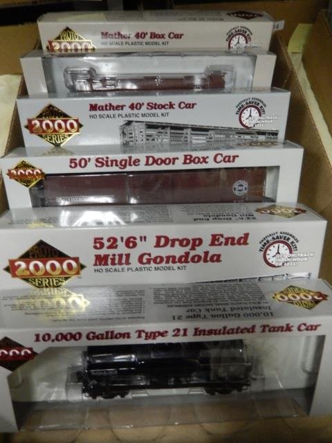 6 WALTHERS TRAINS. PRONTO SERIES 2000. HO SCALE 6: 6 WALTHERS KIT TRAINS. PRONTO SERIES 2000. HO SCALE. EACH ITEM IS NEW IN BOX. LOT INCLUDES: TWO 40' BOX CARS, ONE 40' STOCK CAR, ONE 50' SINGLE DOOR BOX CAR, ONE 52'6" DROP END MILL GONDOLA AND 10,000