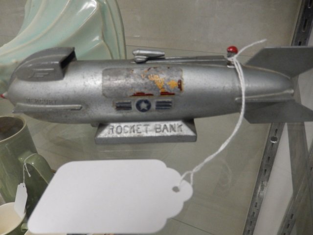 "MERCURY ROCKET BANK" VINTAGE PIGGY BANK APPROX 8.5": APPROX 8.5" LONG AND IN VERY GOOD CONDITION