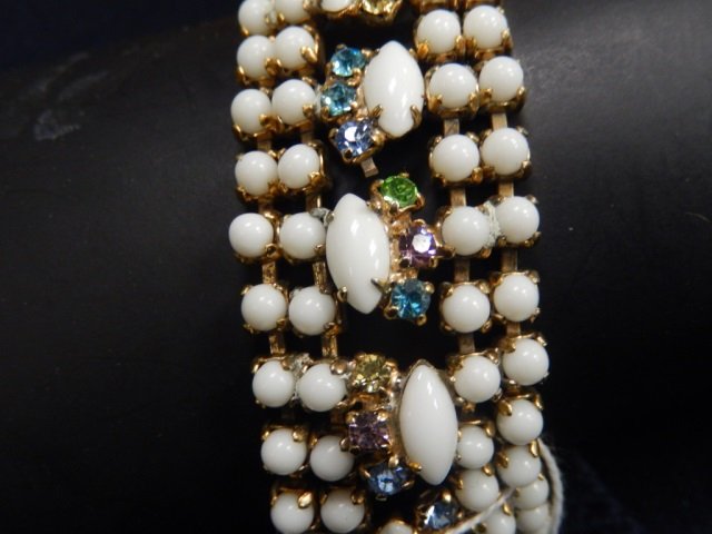 HATTIE CARNEGIE BRACELET APPROX 7" LONG. WHITE THE: APPROX 7" LONG. WHITE THE MULTI COLOR RHINESTONES