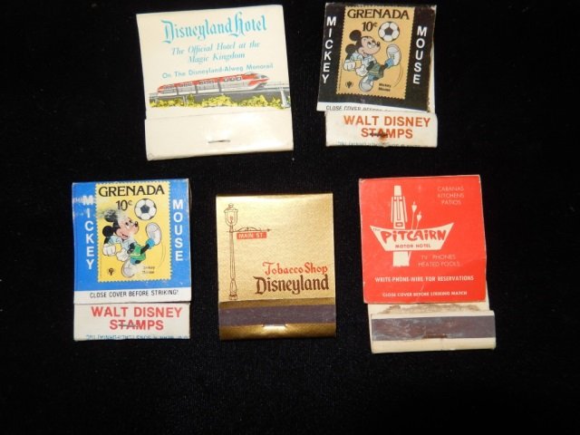 VINTAGE DISNEY MATCH BOOKS LOT INLCUDES 5 VINTAGE: LOT INLCUDES 5 VINTAGE DISNEY MATCH BOOKS. ONE IS FROM THE DISNEYLAND HOTEL, 1 FROM THE DISNEYLAND TOBACCO SHOP, 2 ARE WALT DISNEY / MICKEY MOUSE STAMPS AND 1 IS FROM THE PITCARIN MOTOR HOTEL