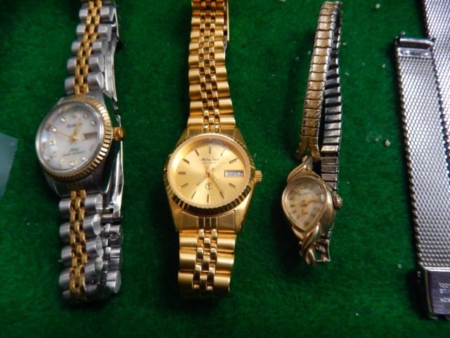 3 LADIES WATCHES ONE BY BULOVA . LOT INCLUDES ONE: ONE BY BULOVA . LOT INCLUDES ONE ADDITIONAL BAND. ALL IN GOOD CONDITION
