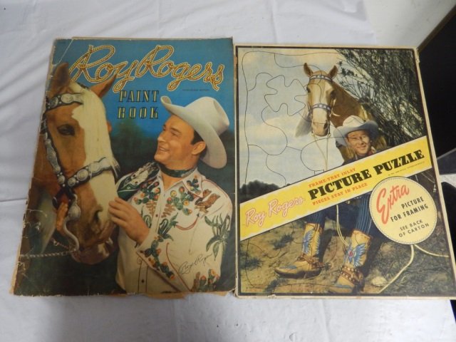 VINTAGE GENE AUTRY, LONE RANGERS, ROY ROGERS LOT: LOT INCLUDES ROY ROGERS PAINT BOOK (1948) AND PITCURE PUZZLE (1950), 2 COPIES OF "GENE AUTRY AND THE THIEF RIVER OUTLAWS", 1 COPY OF "THE LONE RANER TRAPS THE SMUGGLERS" AND THE LONE RANGER BOARD GAME